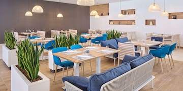 a room with tables and chairs