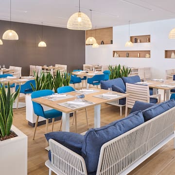 a room with tables and chairs