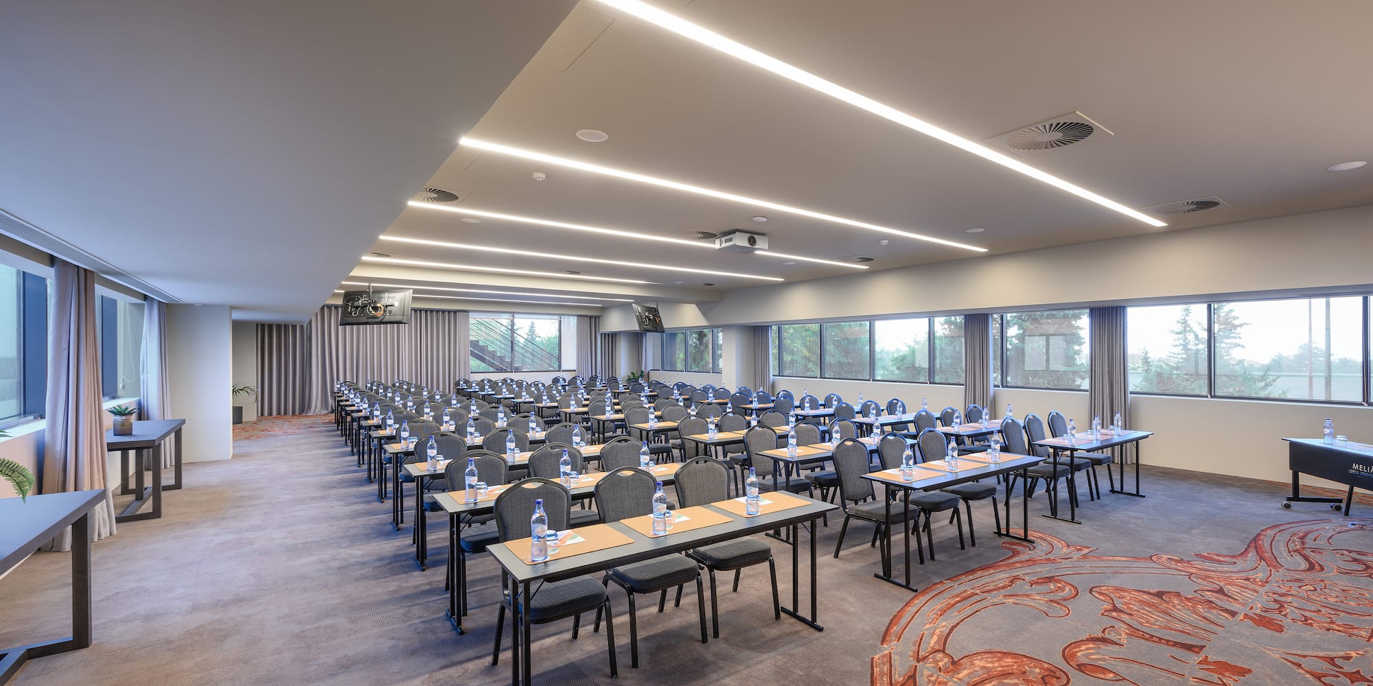 a room with tables and chairs