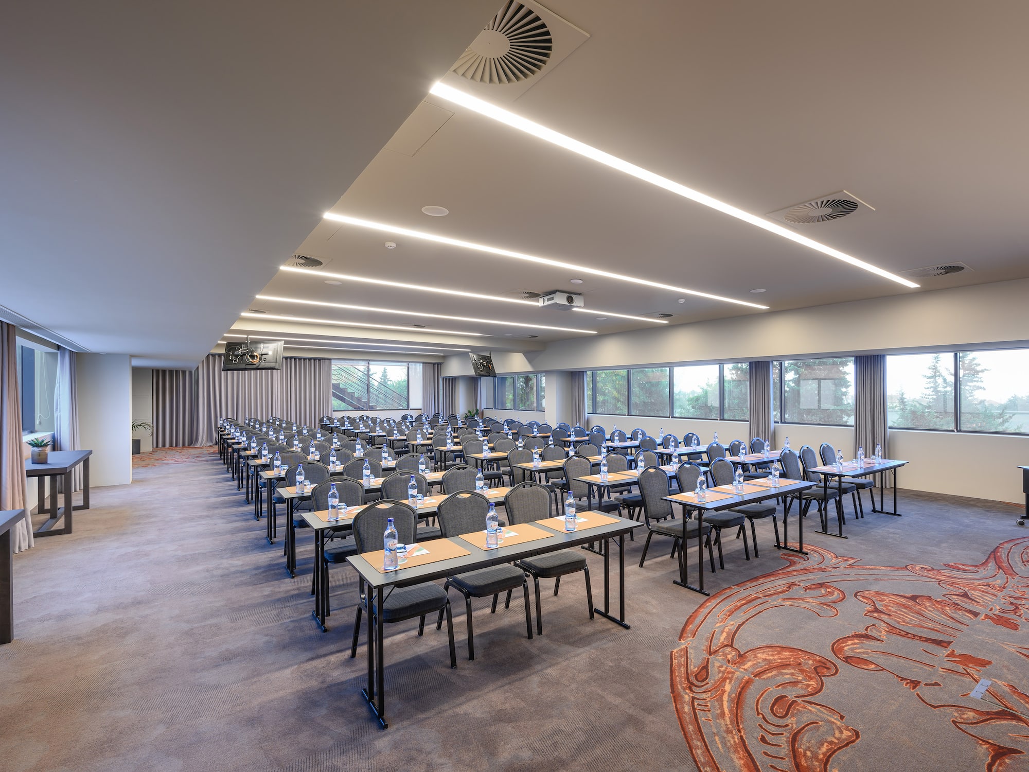 a room with tables and chairs