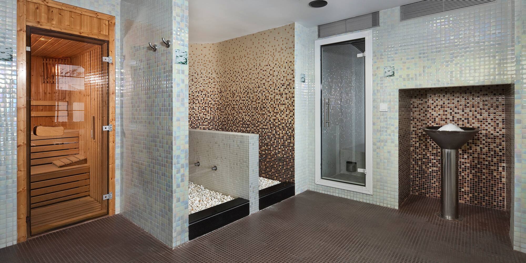 a bathroom with a shower and sauna