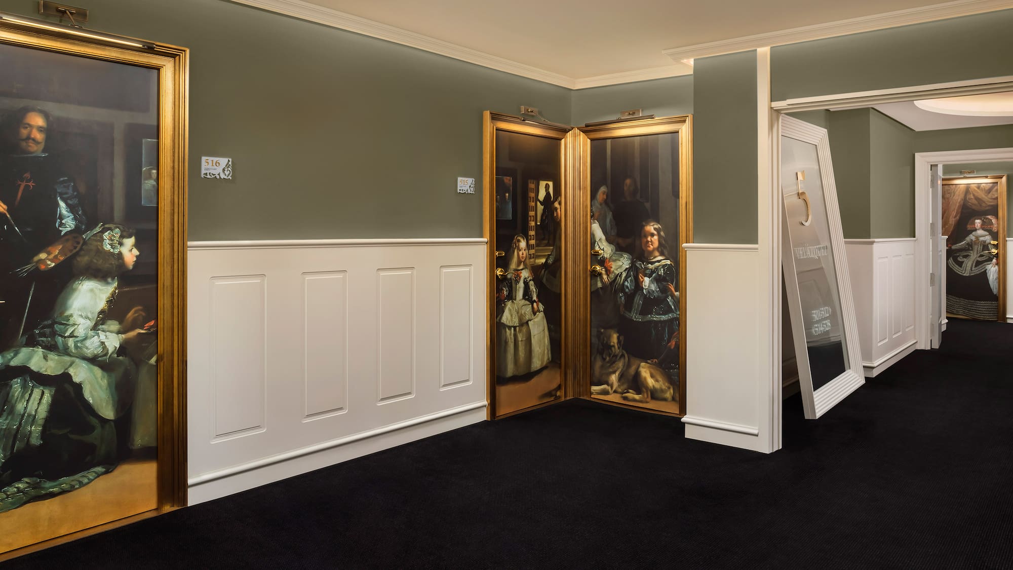 a room with a painting on the wall