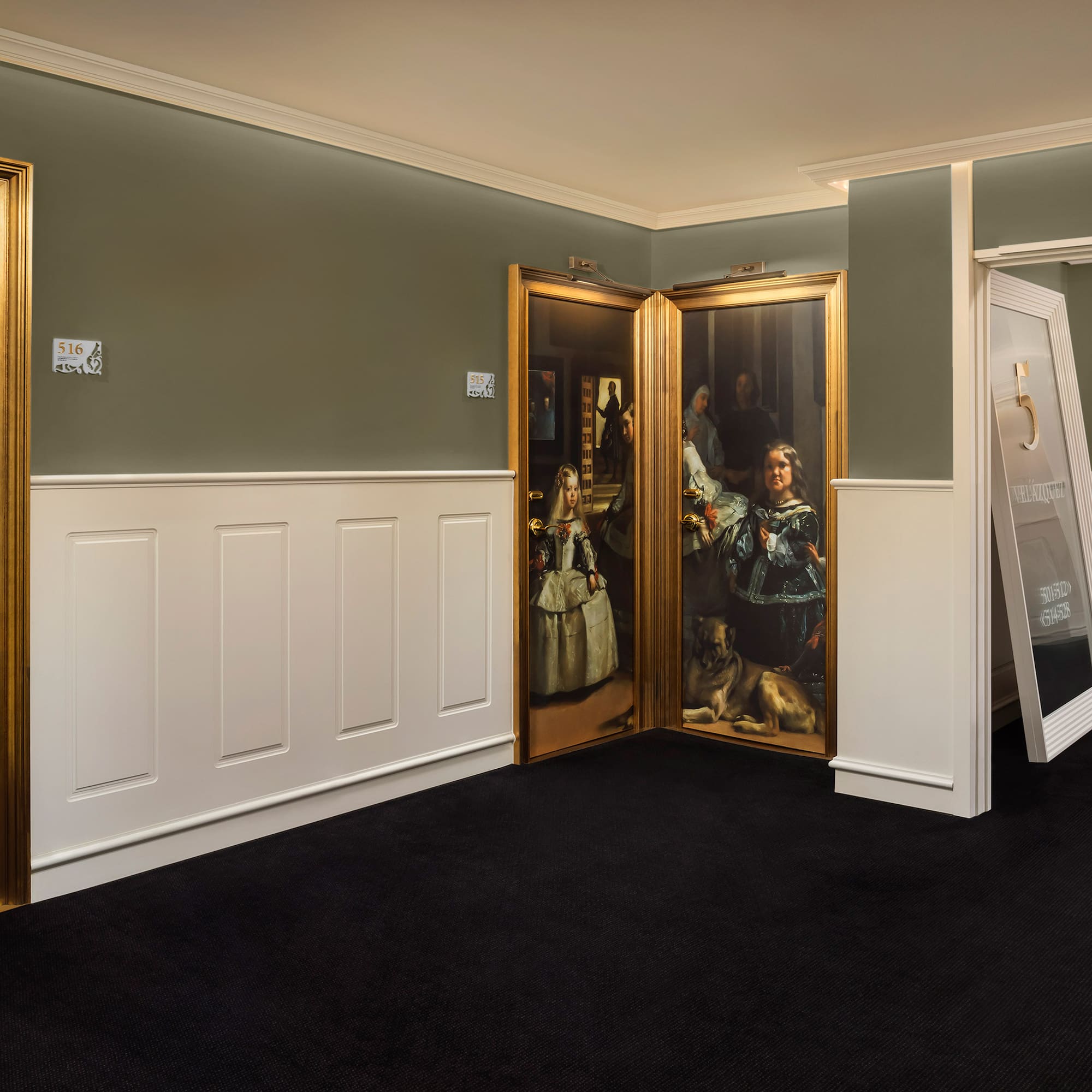 a room with a painting on the wall