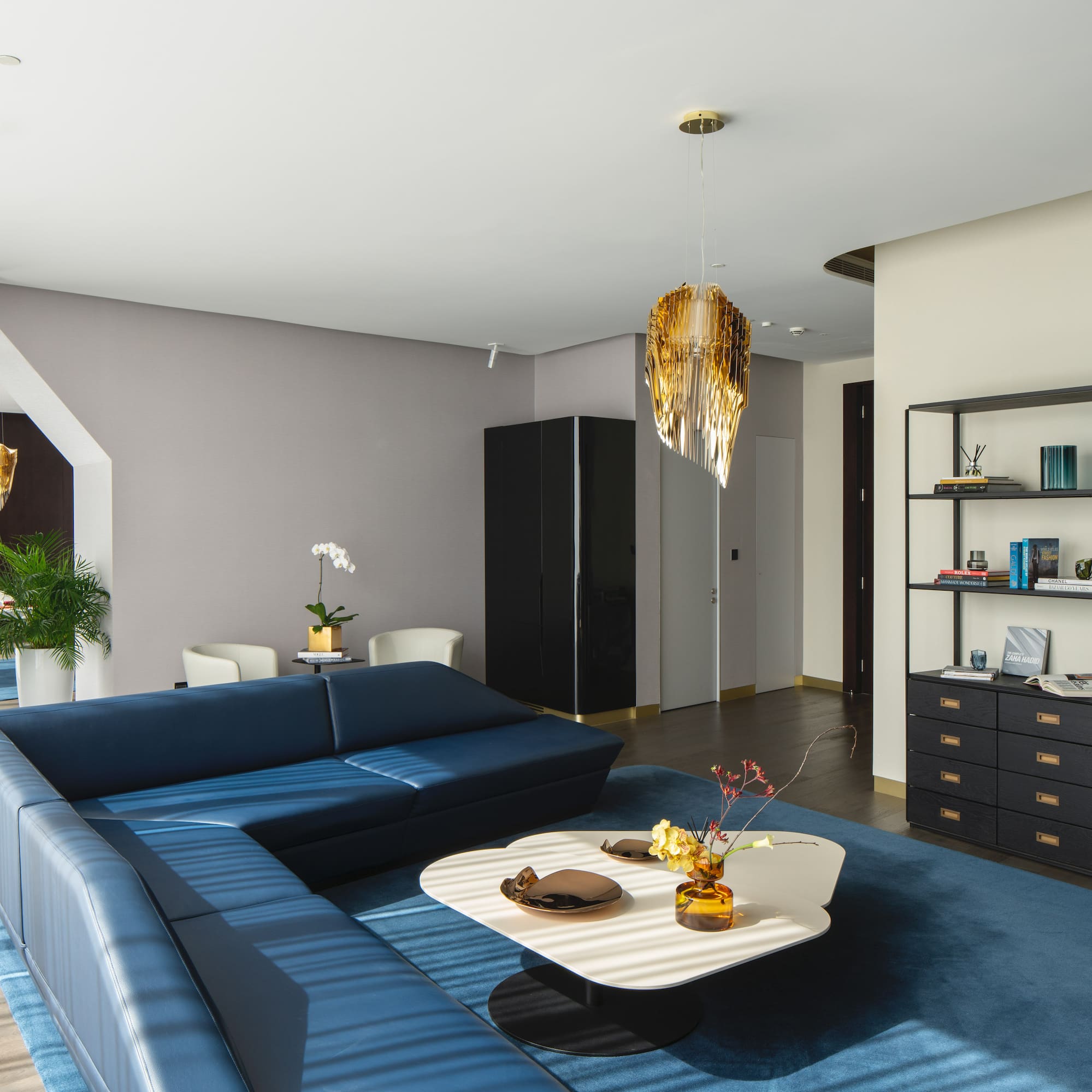 a living room with a couch and a table