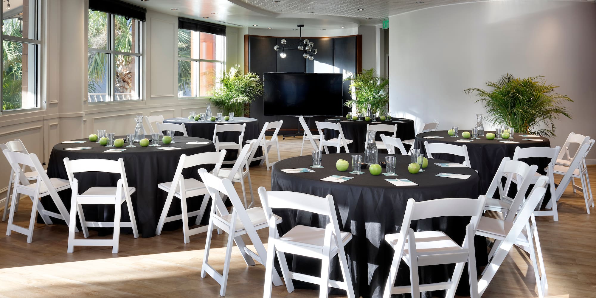 a room with tables and chairs