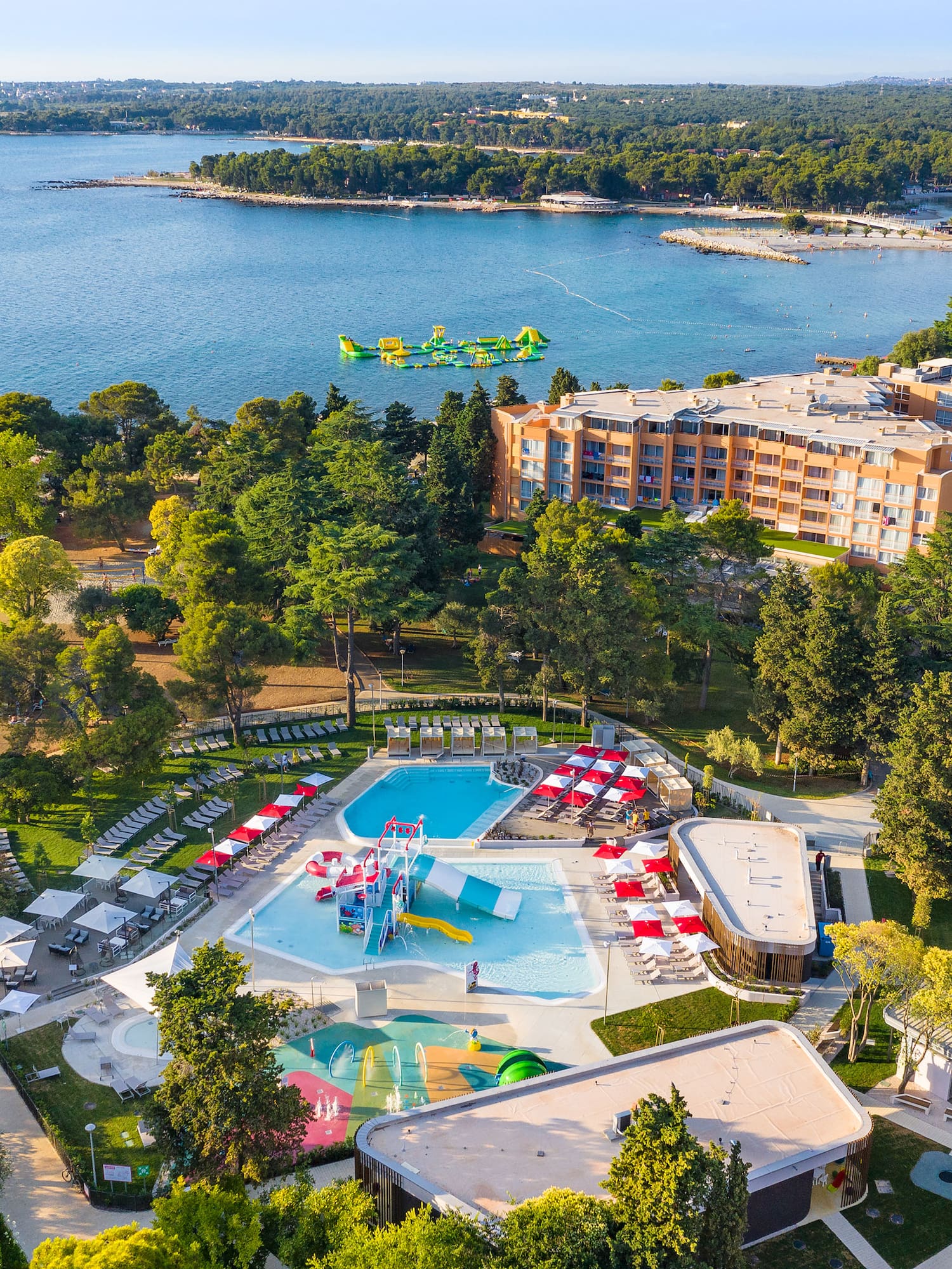 a swimming pool and a body of water