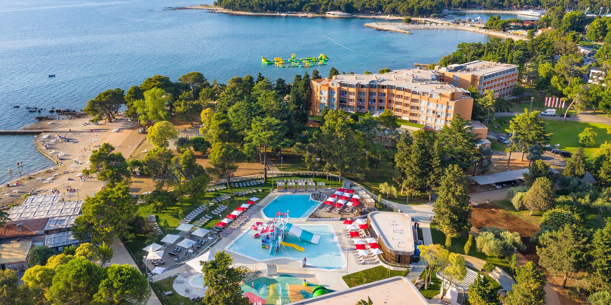 a swimming pool and a body of water