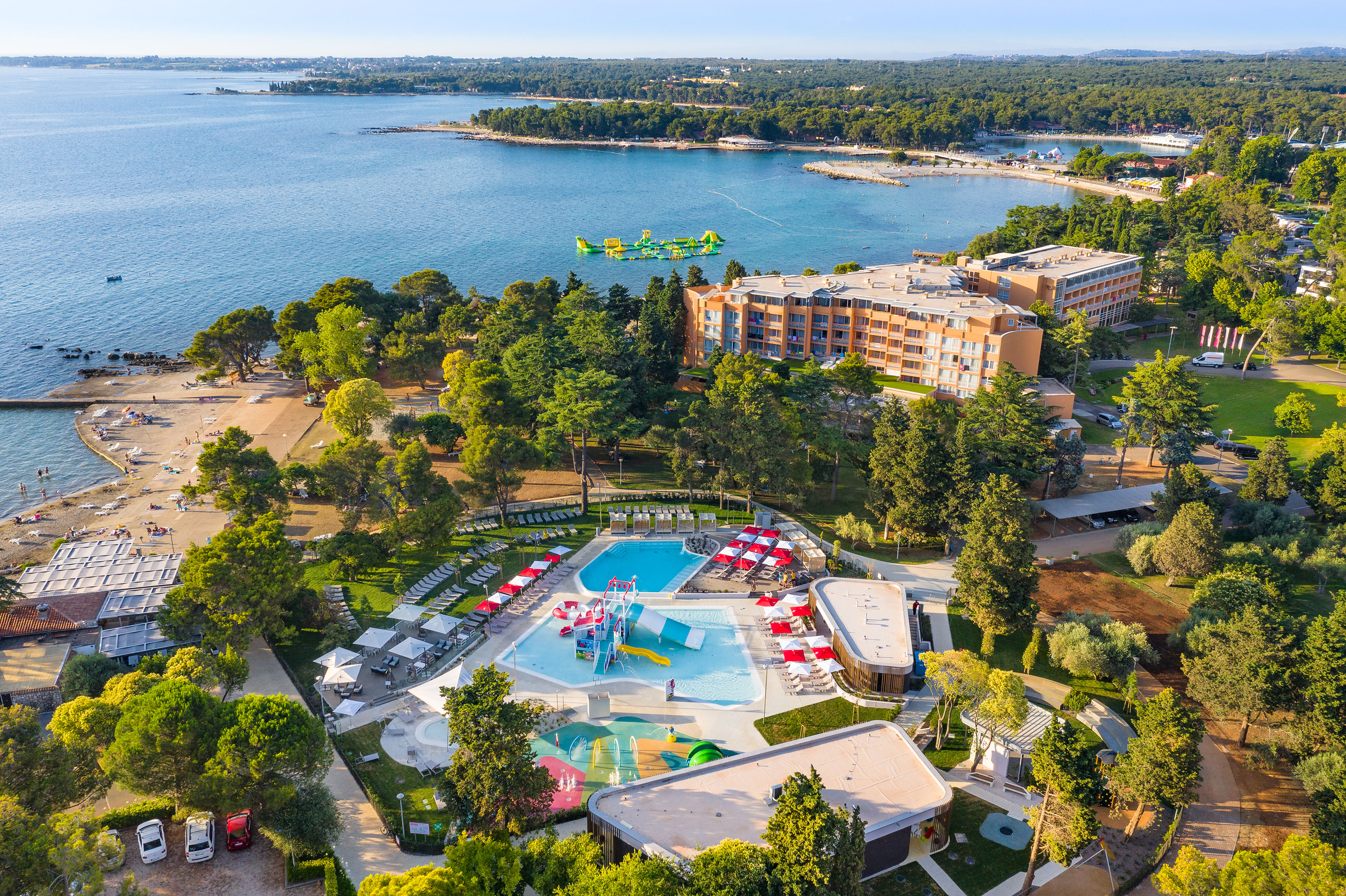 a swimming pool and a body of water