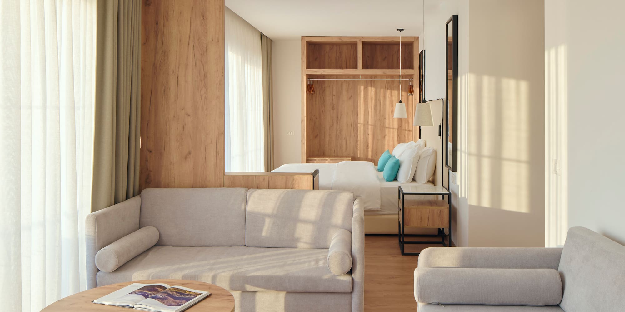 a room with couches and a bed