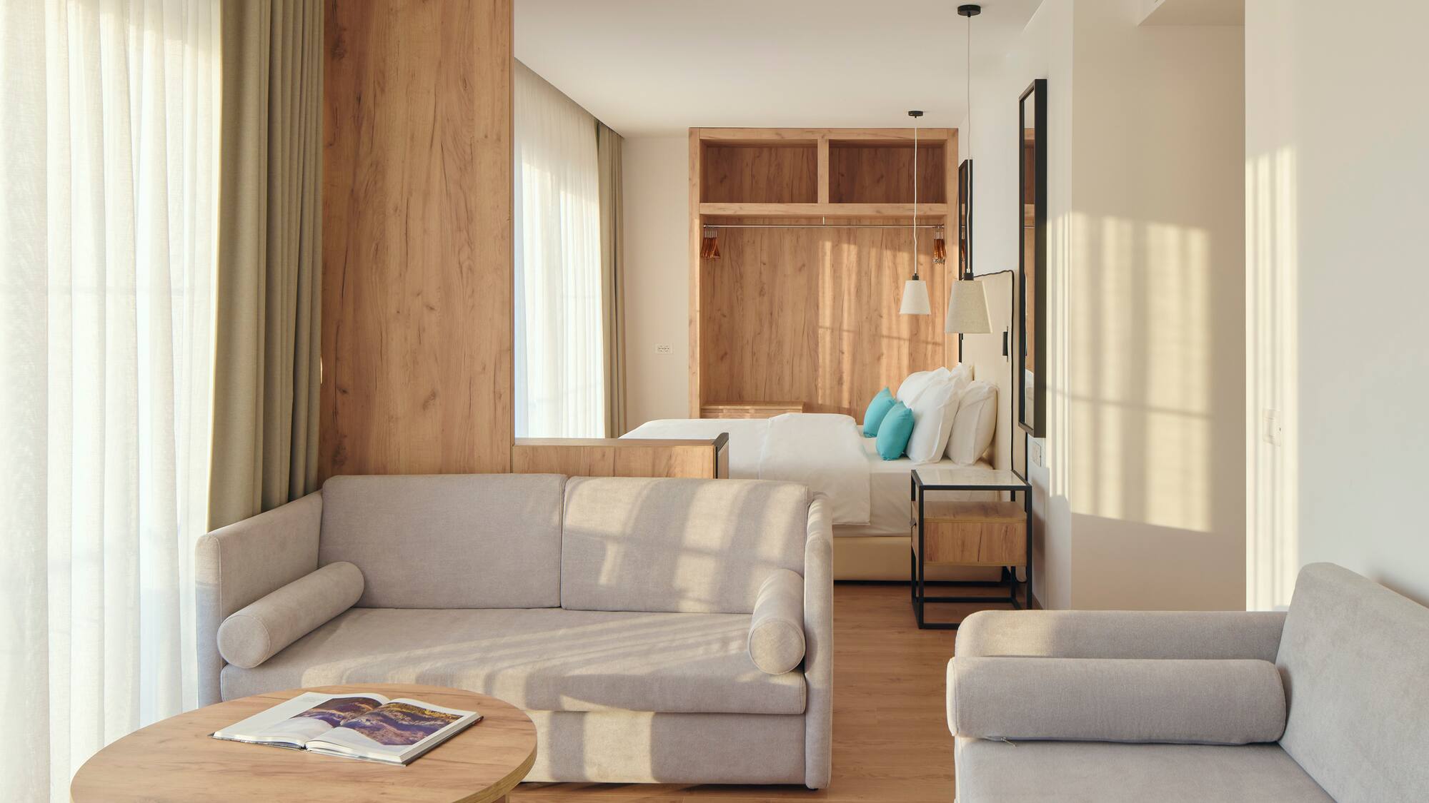 a room with couches and a bed