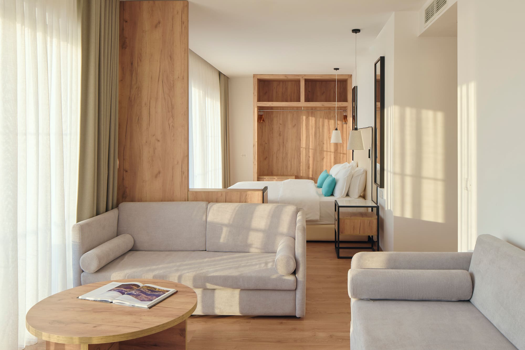 a room with couches and a bed