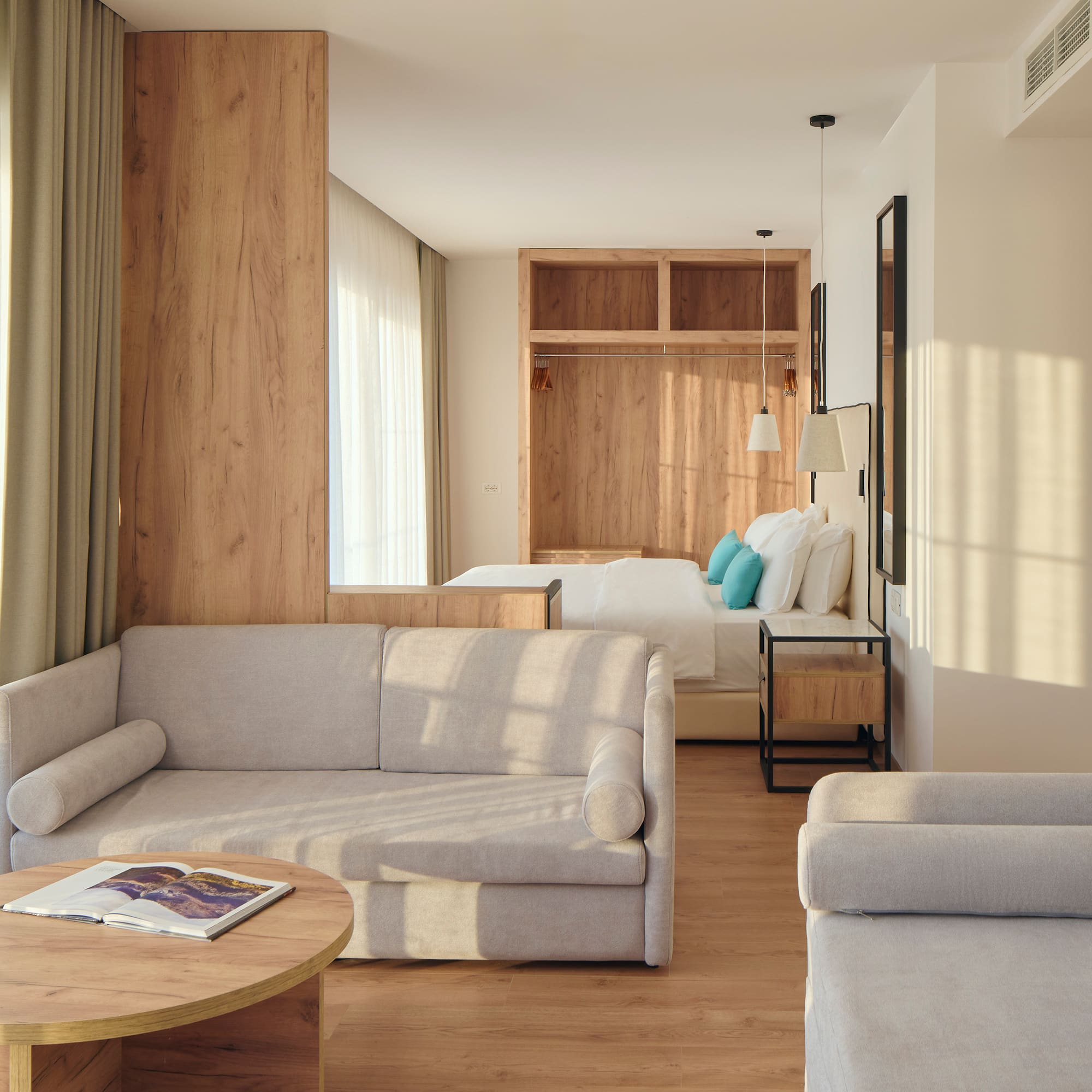 a room with couches and a bed