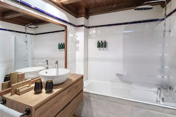 a bathroom with a sink and bathtub