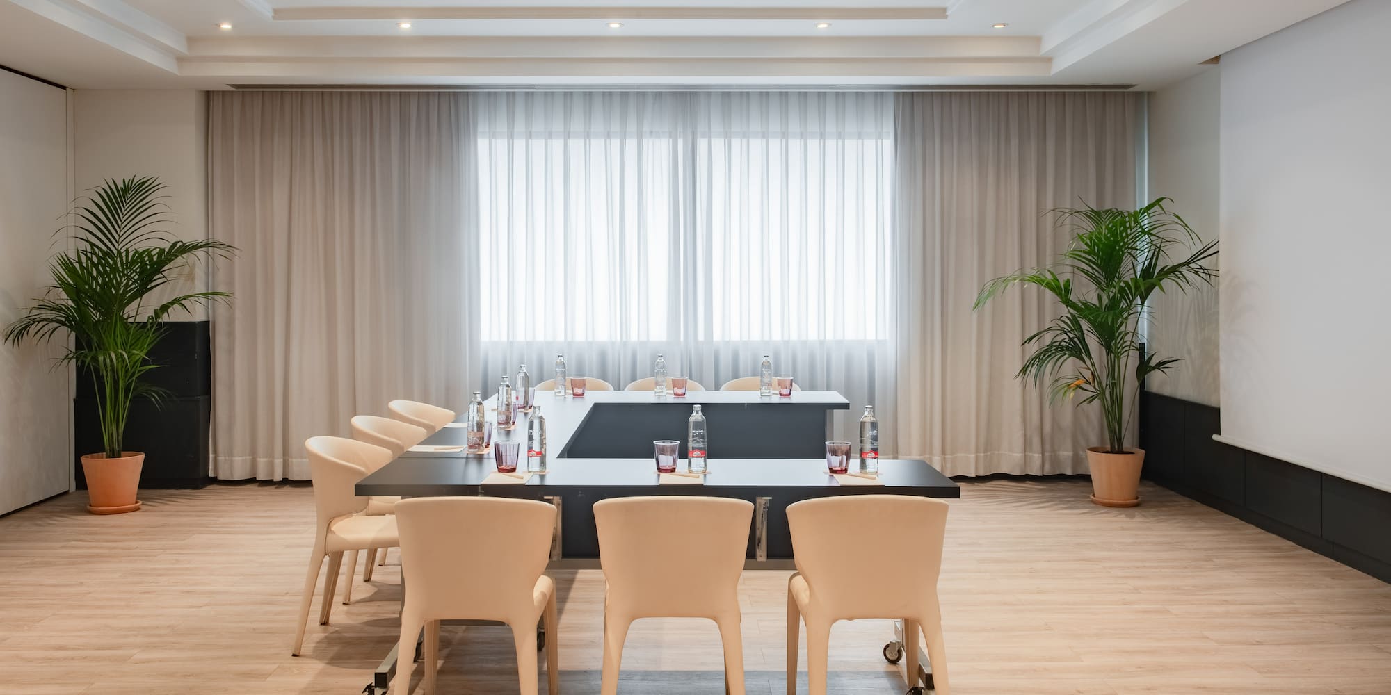 a room with a table and chairs