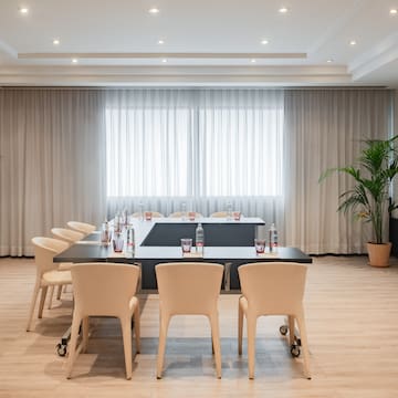 a room with a table and chairs