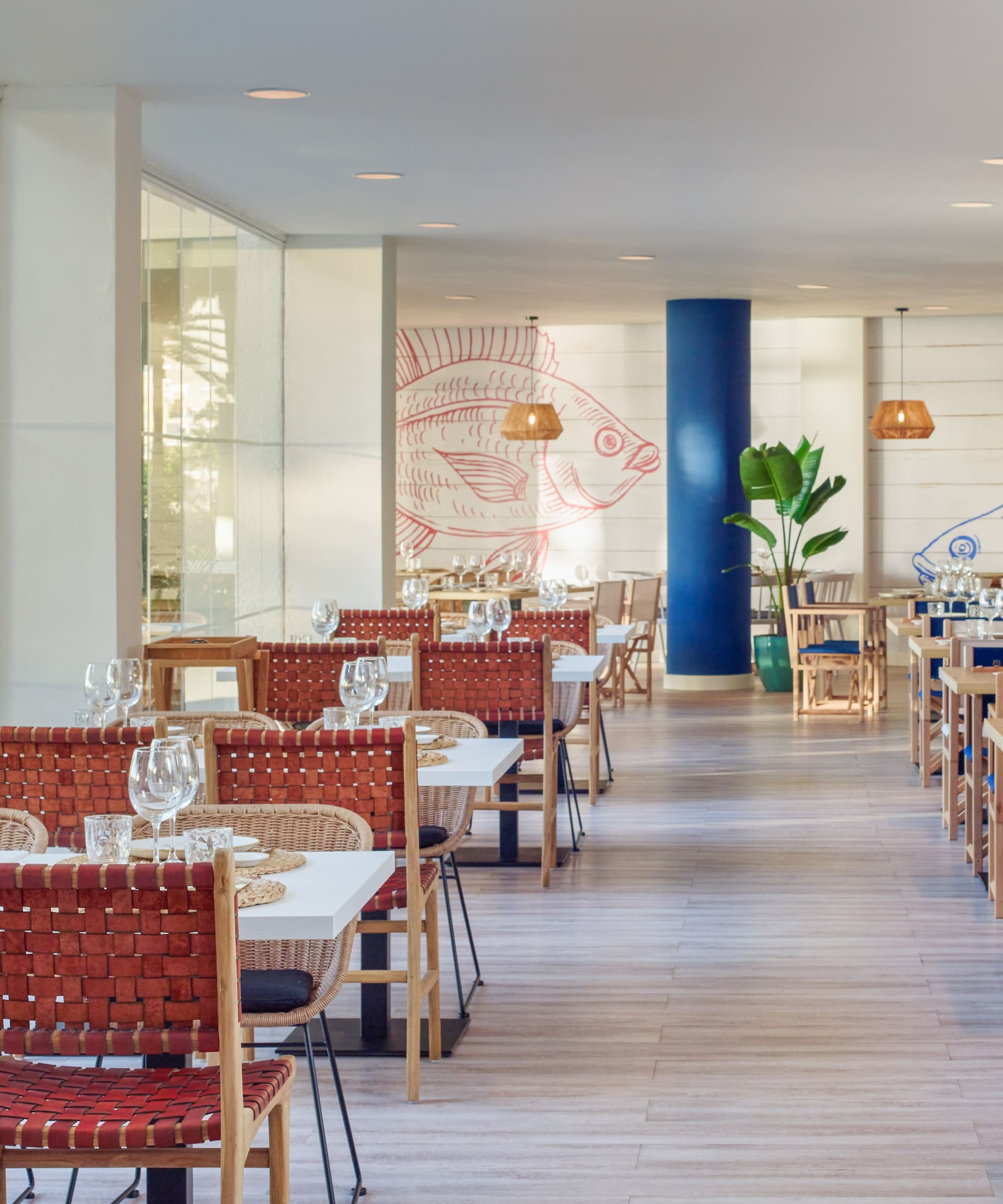 a restaurant with tables and chairs