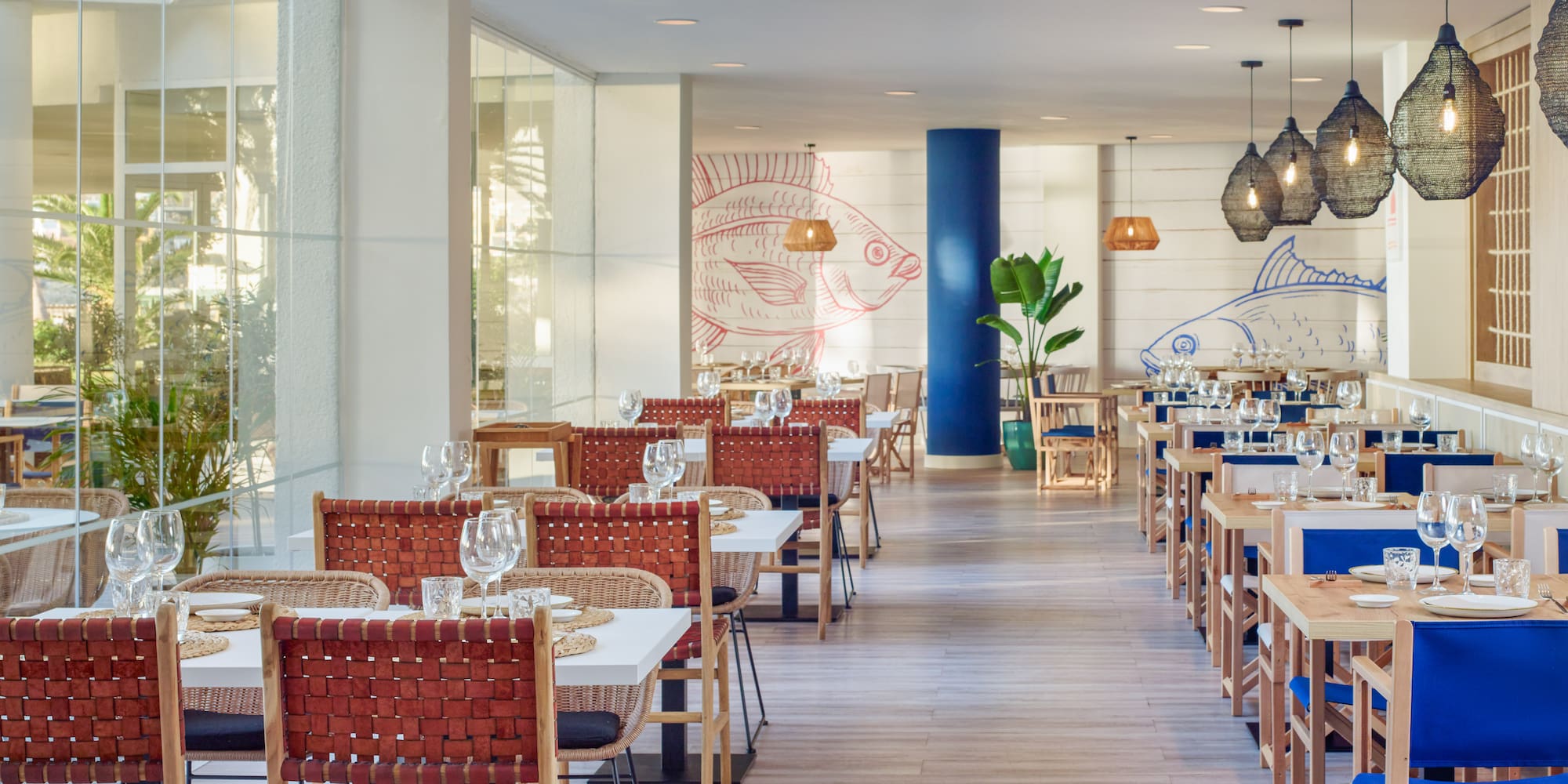 a restaurant with tables and chairs