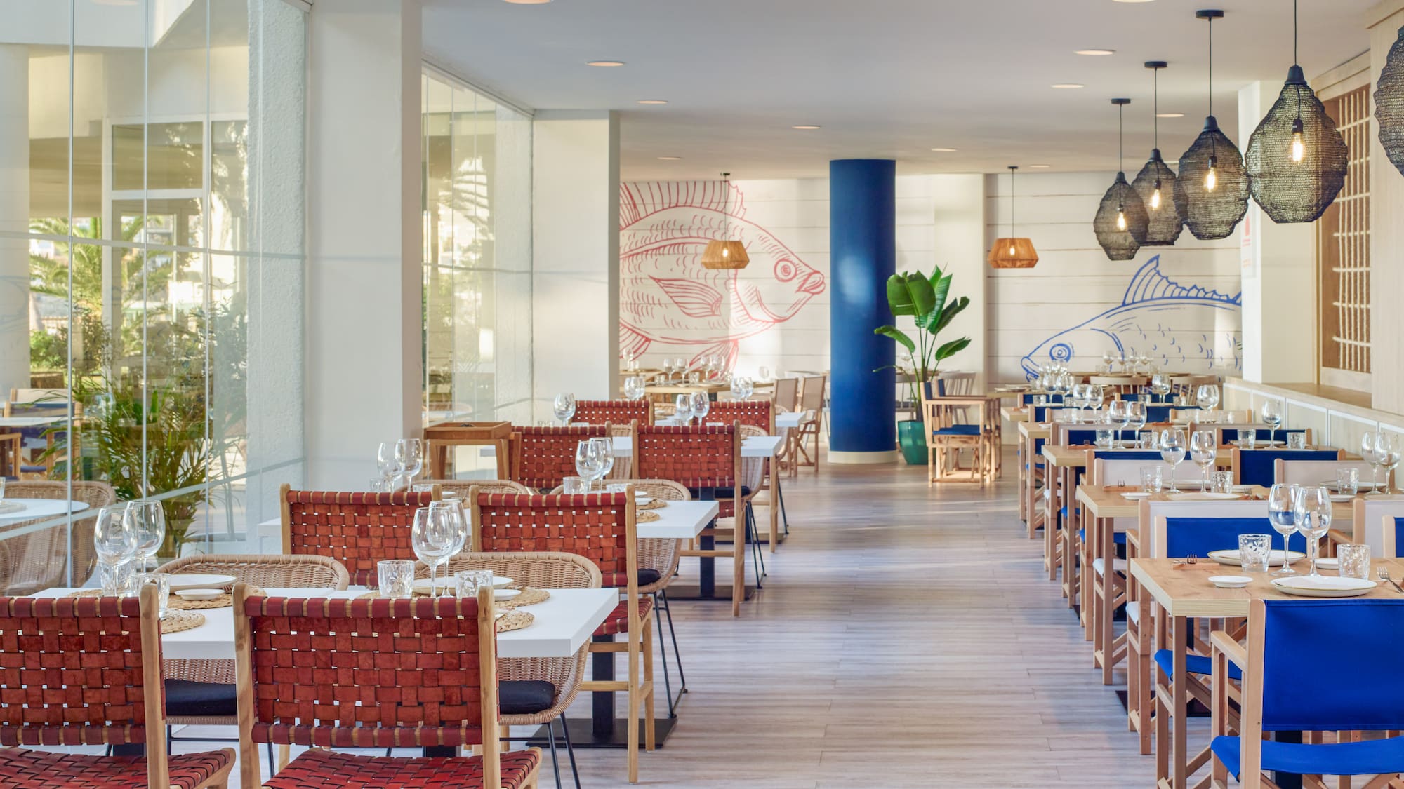 a restaurant with tables and chairs