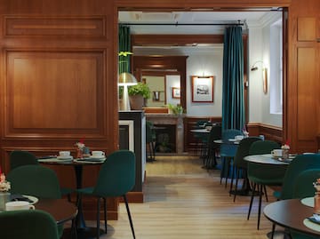 a room with tables and chairs