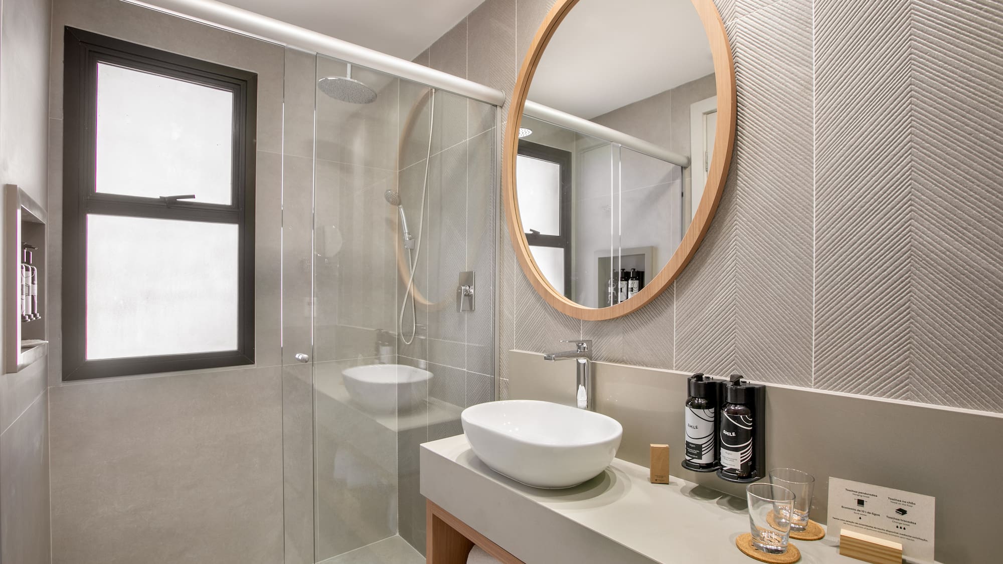 a bathroom with a mirror and sink