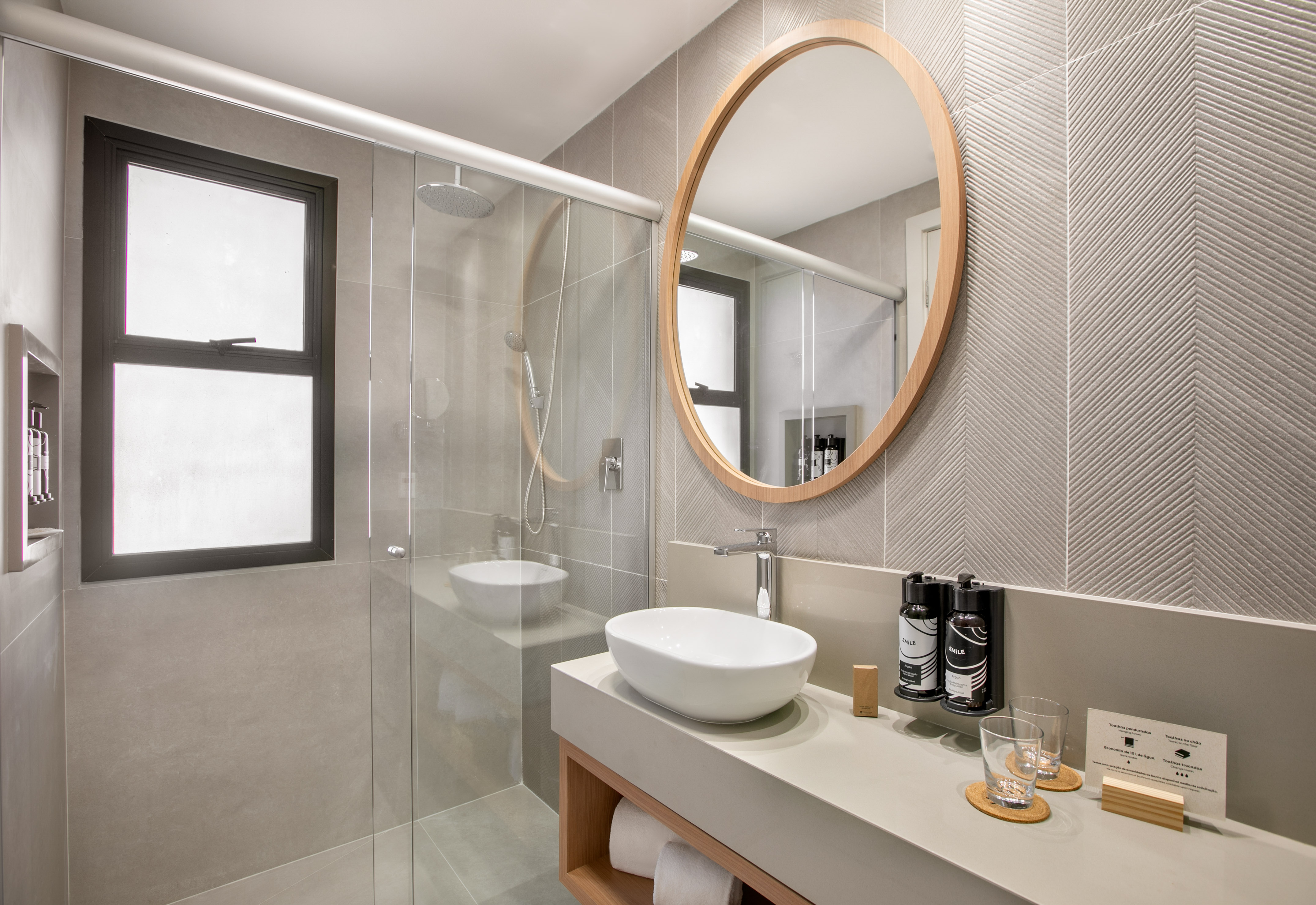 a bathroom with a mirror and sink