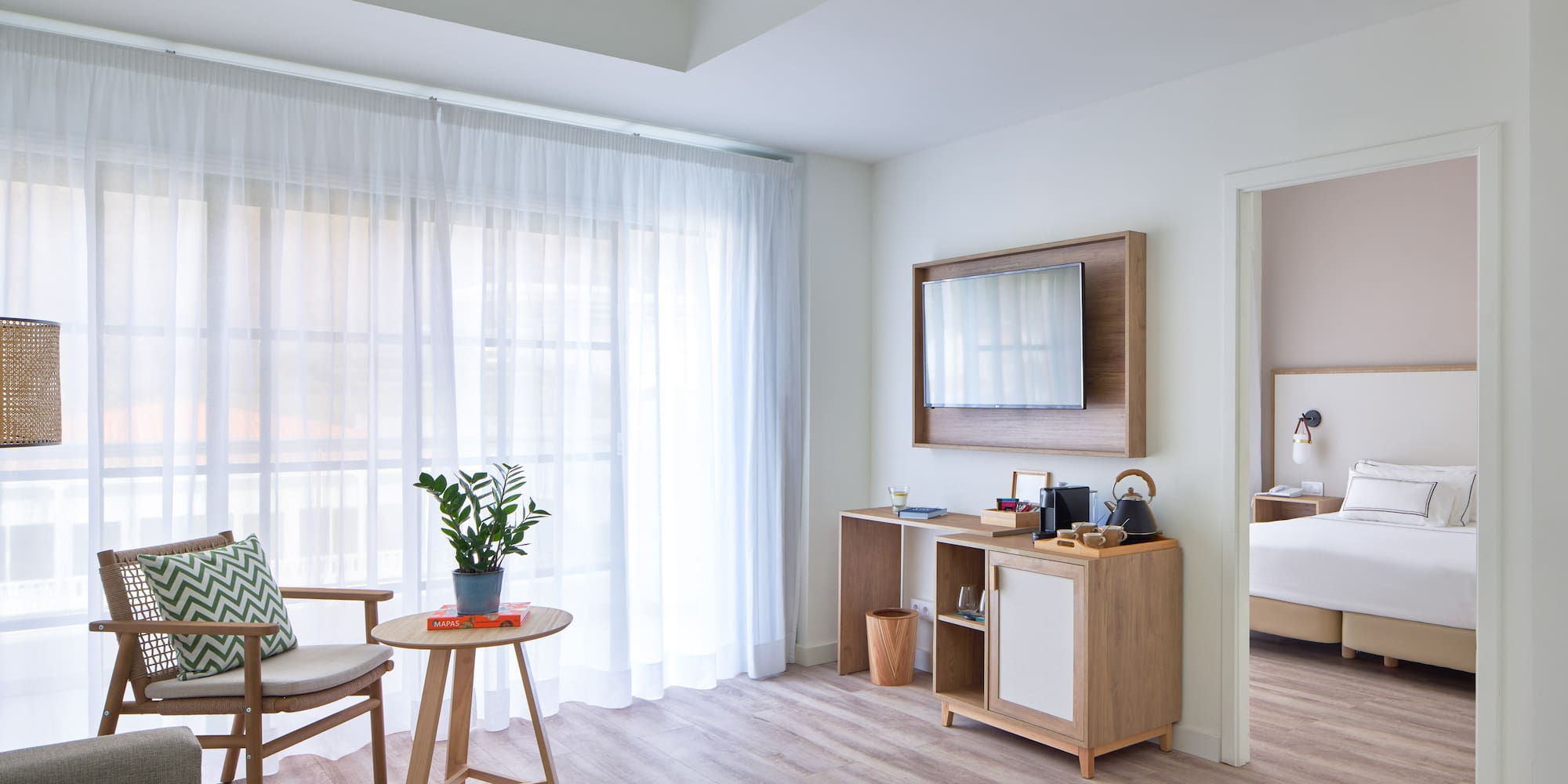 a room with a bed and a chair