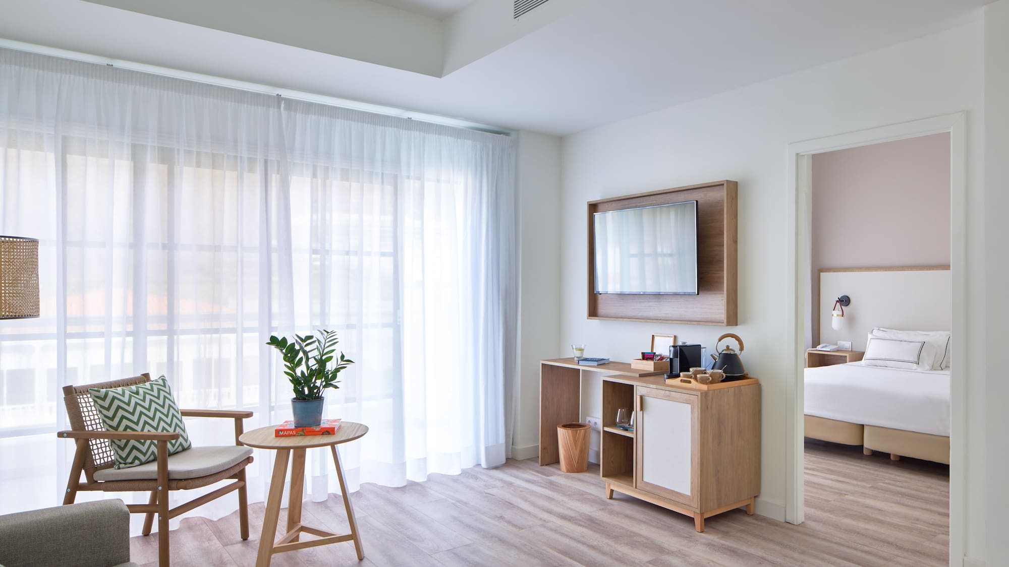 a room with a bed and a chair