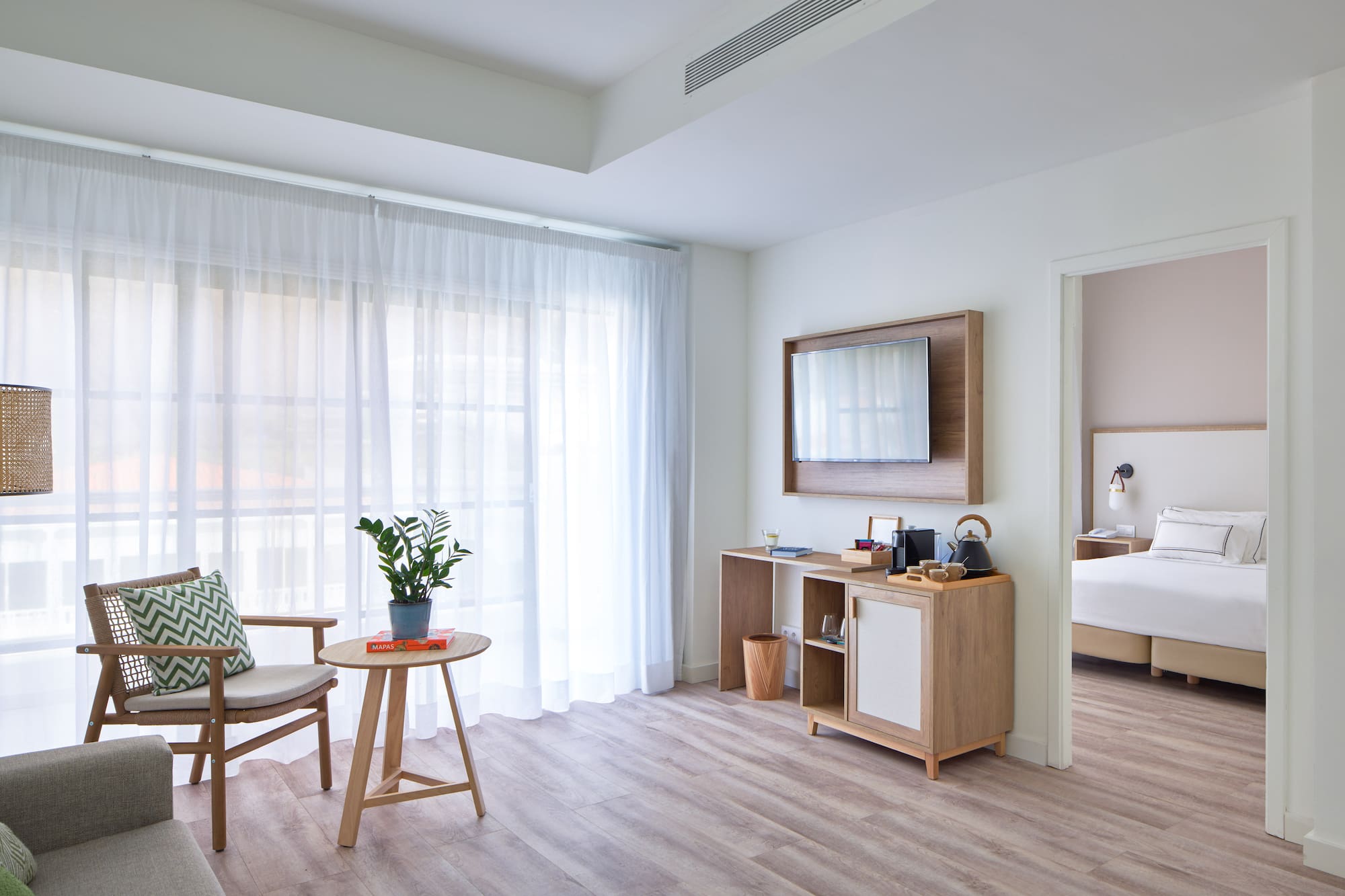 a room with a bed and a chair