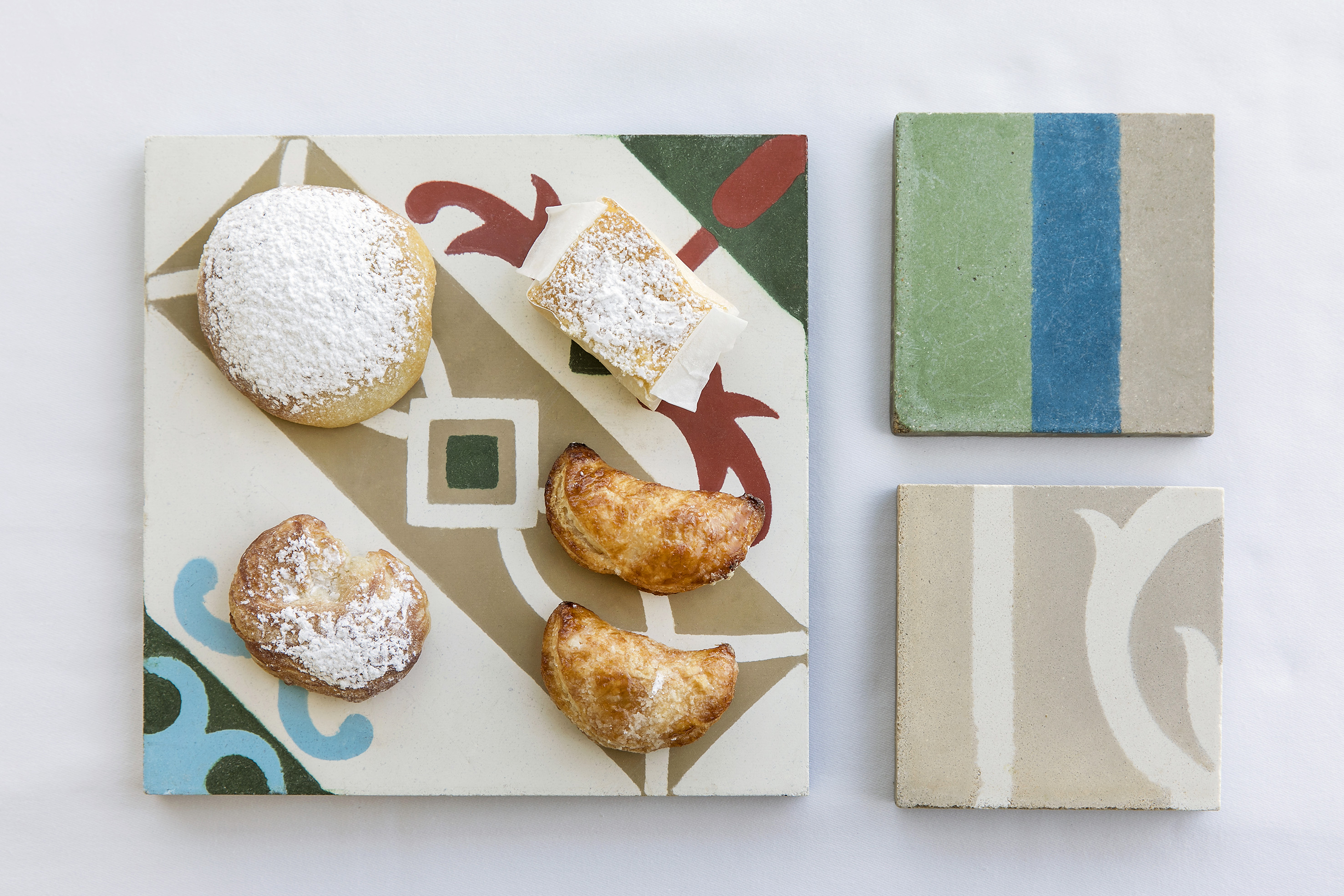 a plate of pastries and cheese