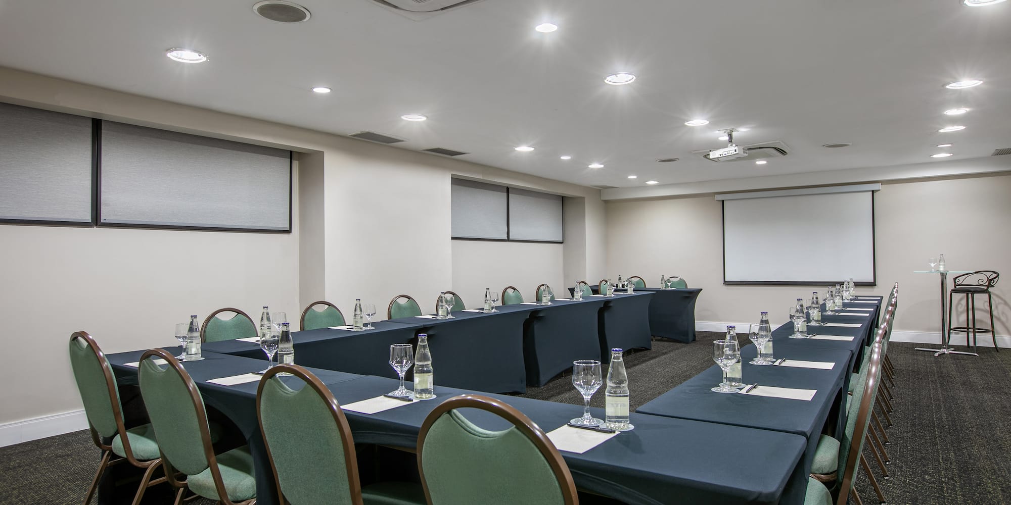 a room with tables and chairs
