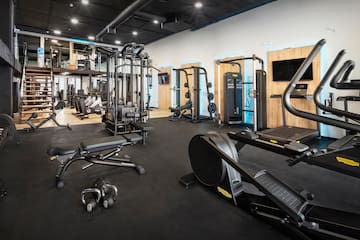a large gym with exercise equipment