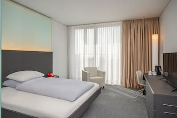 a room with a bed and a desk