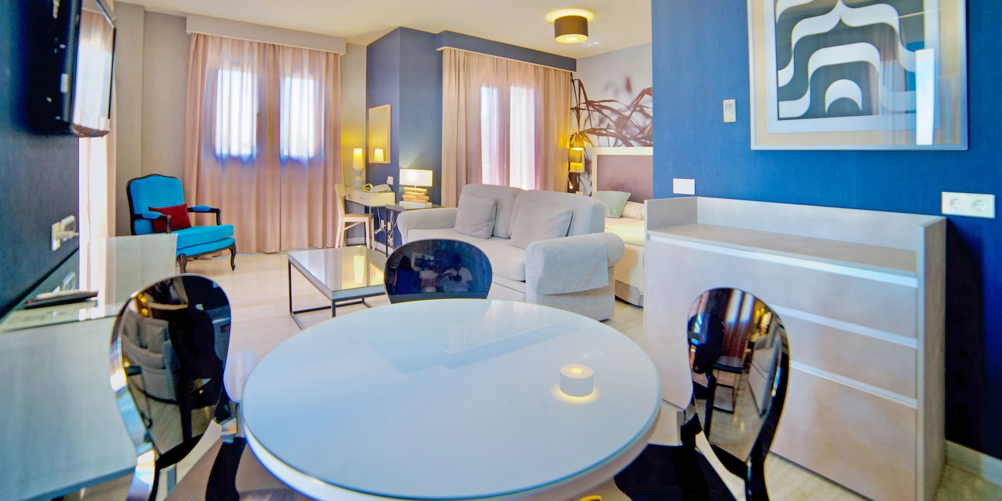 a room with a table and chairs