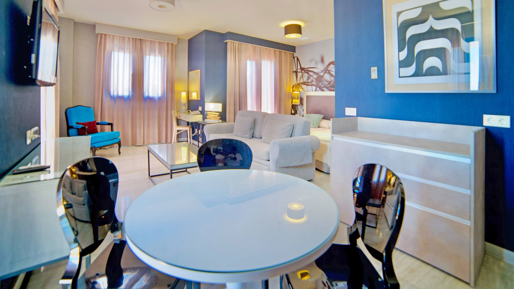 a room with a table and chairs