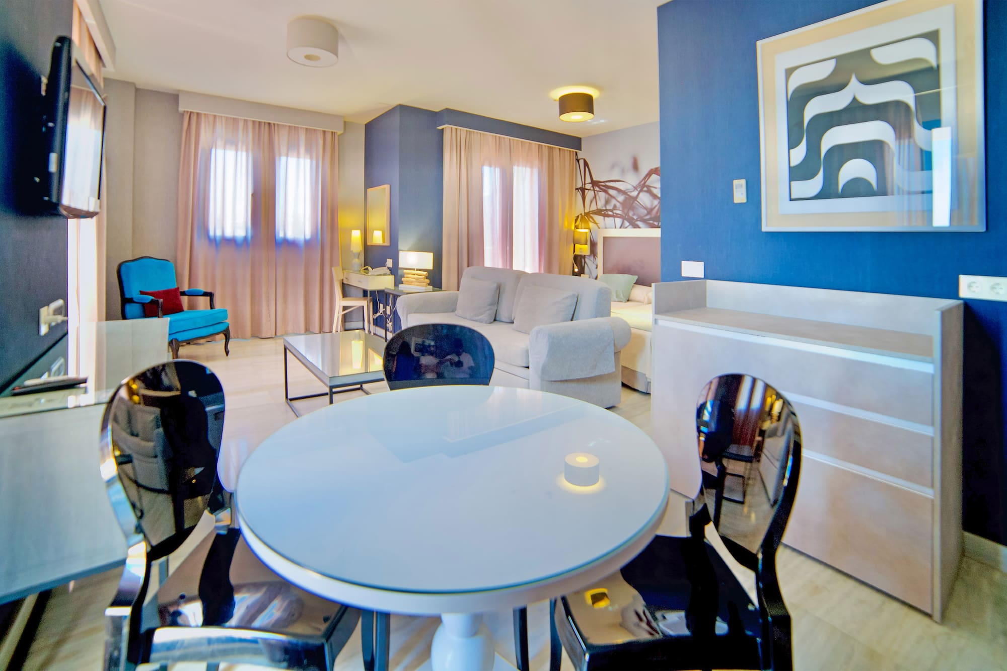 a room with a table and chairs