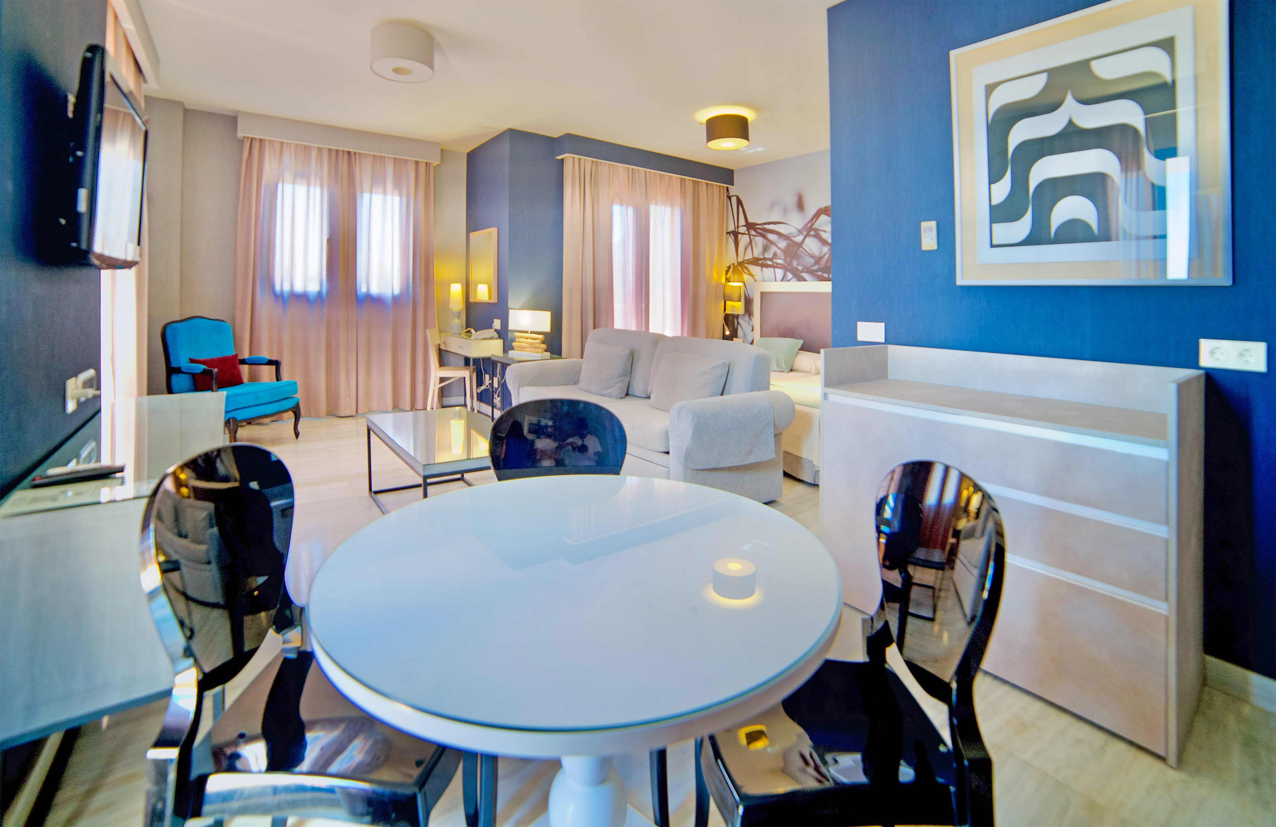 a room with a table and chairs