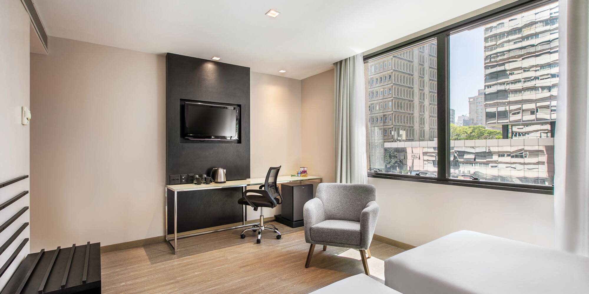 a room with a tv and a chair