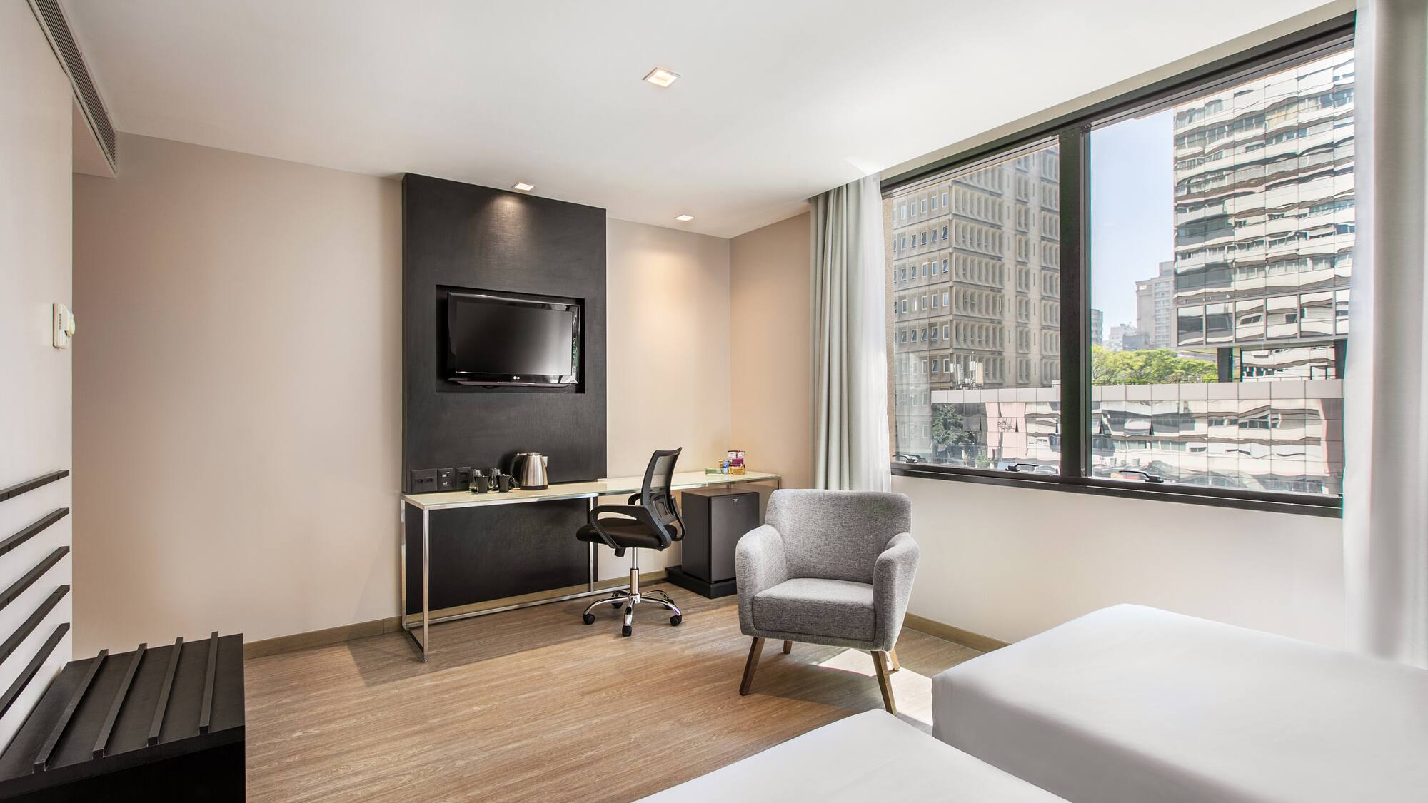 a room with a tv and a chair