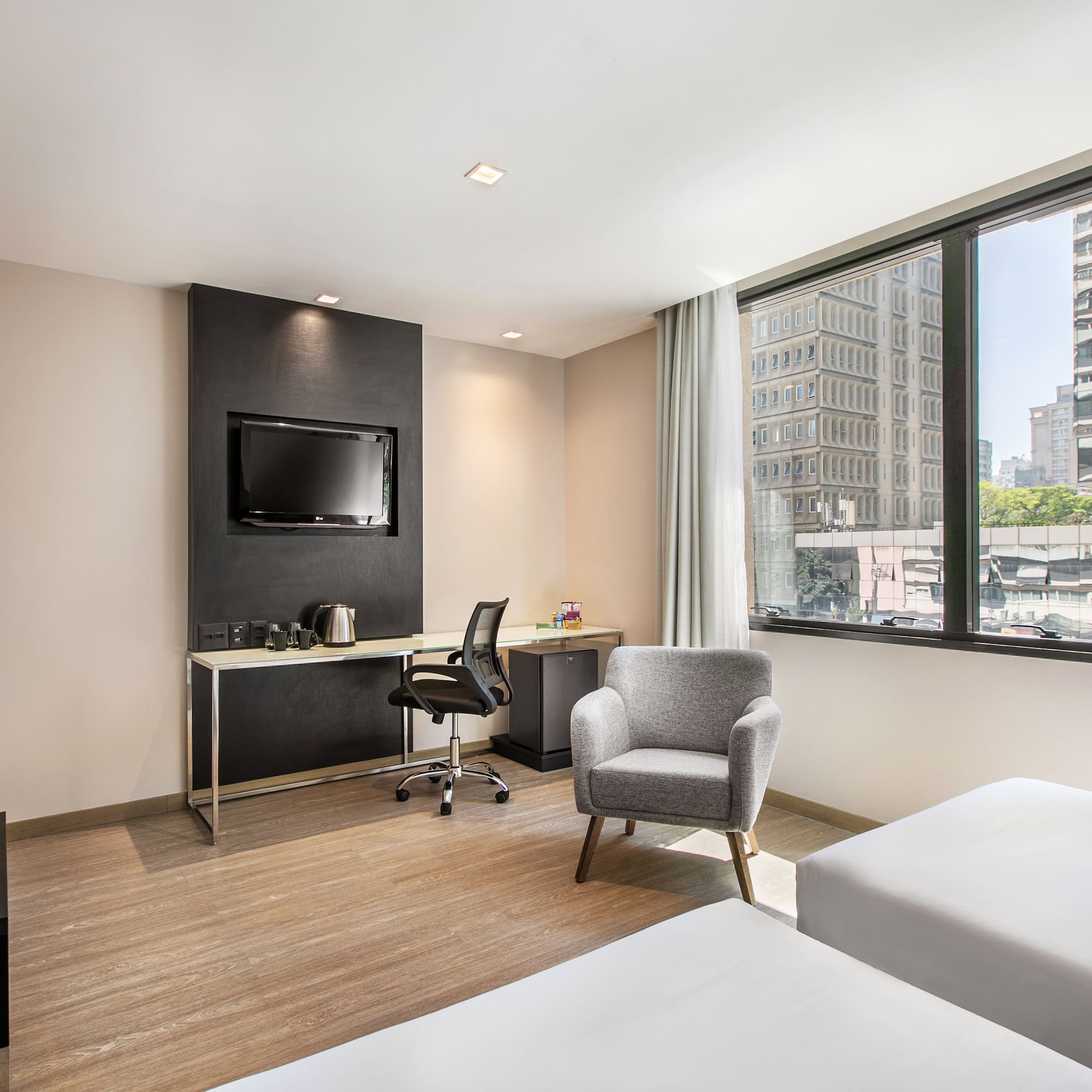 a room with a tv and a chair