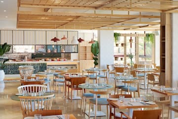 a room with tables and chairs