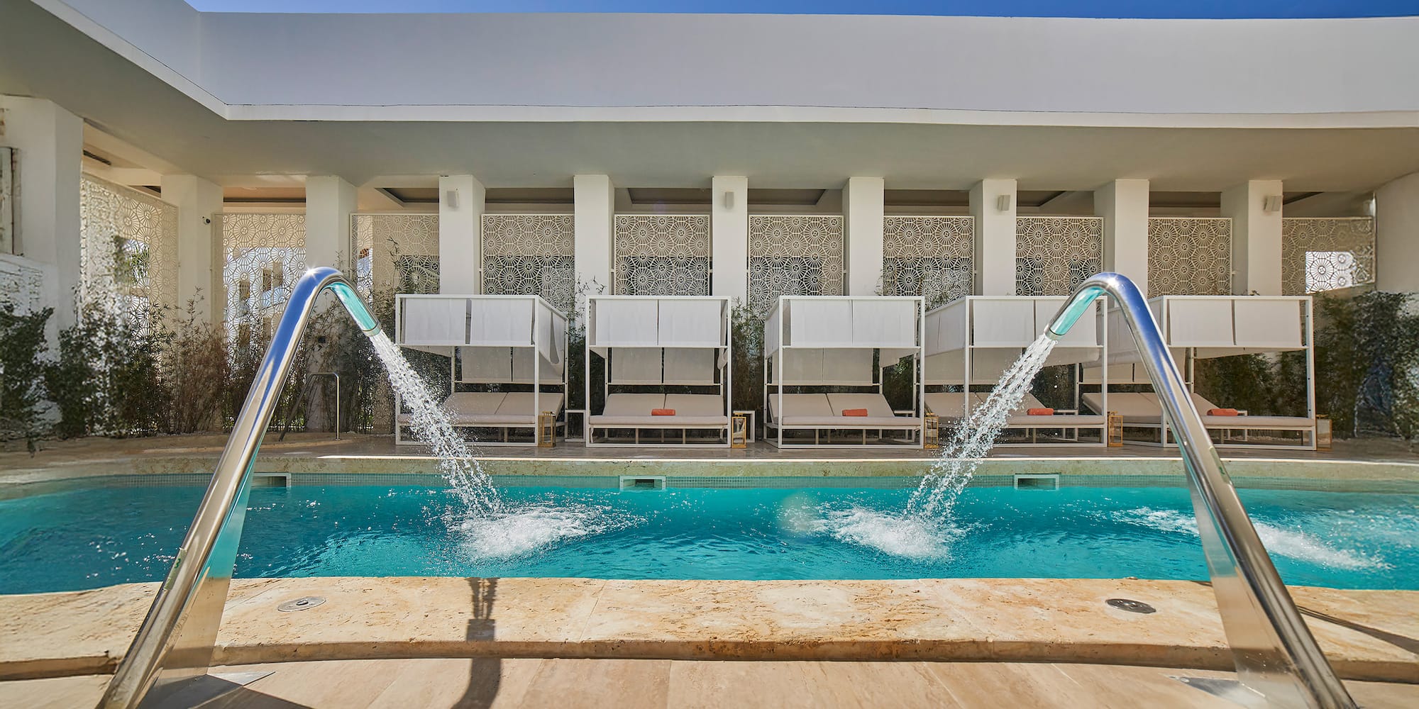 a pool with water jets coming out of it