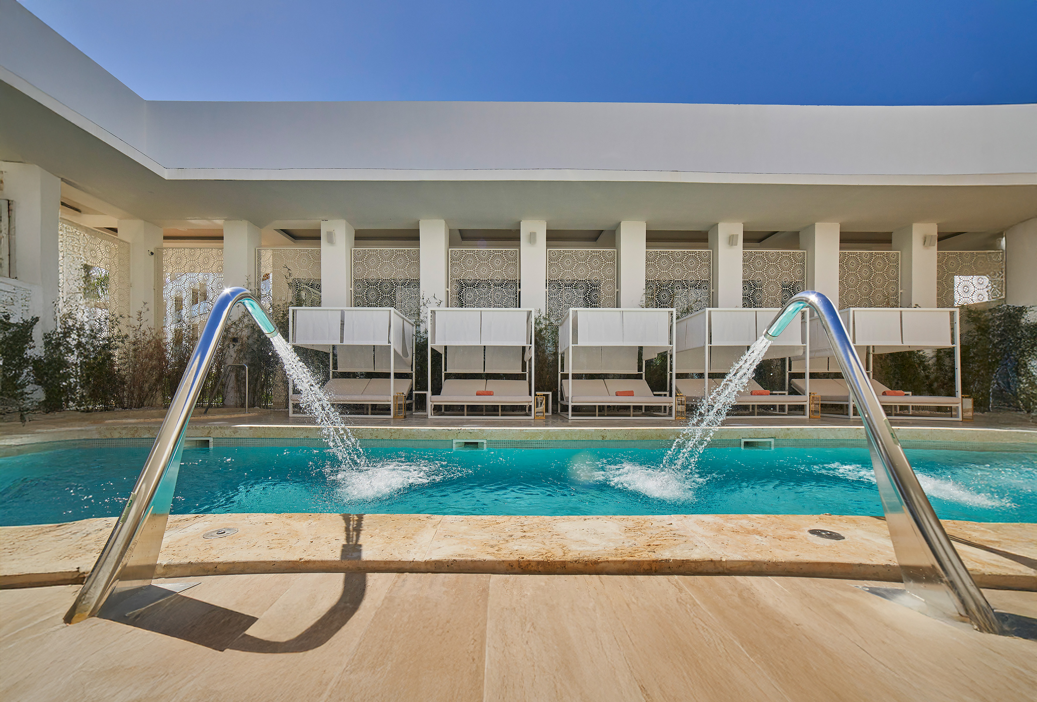 a pool with water jets coming out of it