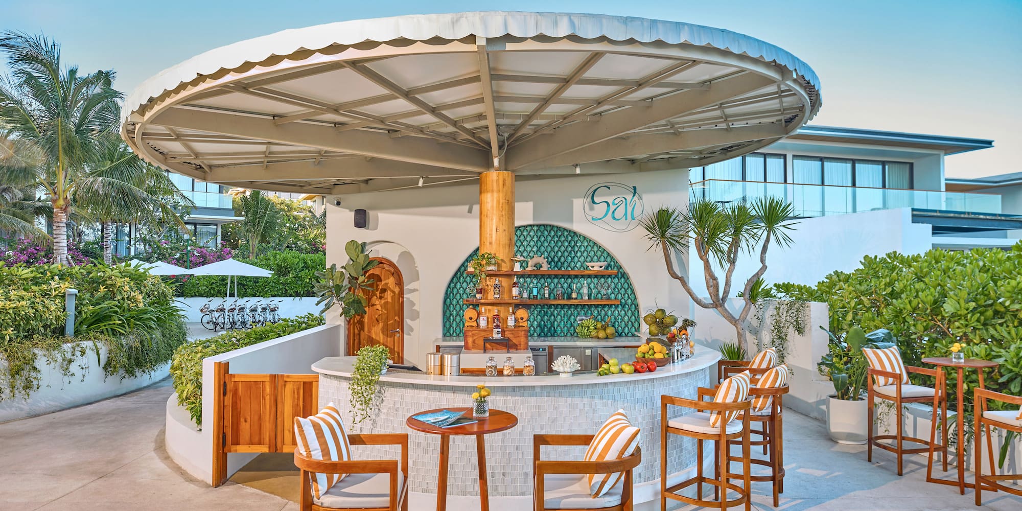 a bar with chairs and a table