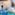 Indoor arctic splash pad: Olaf, penguins, water sprays, igloo slide.
