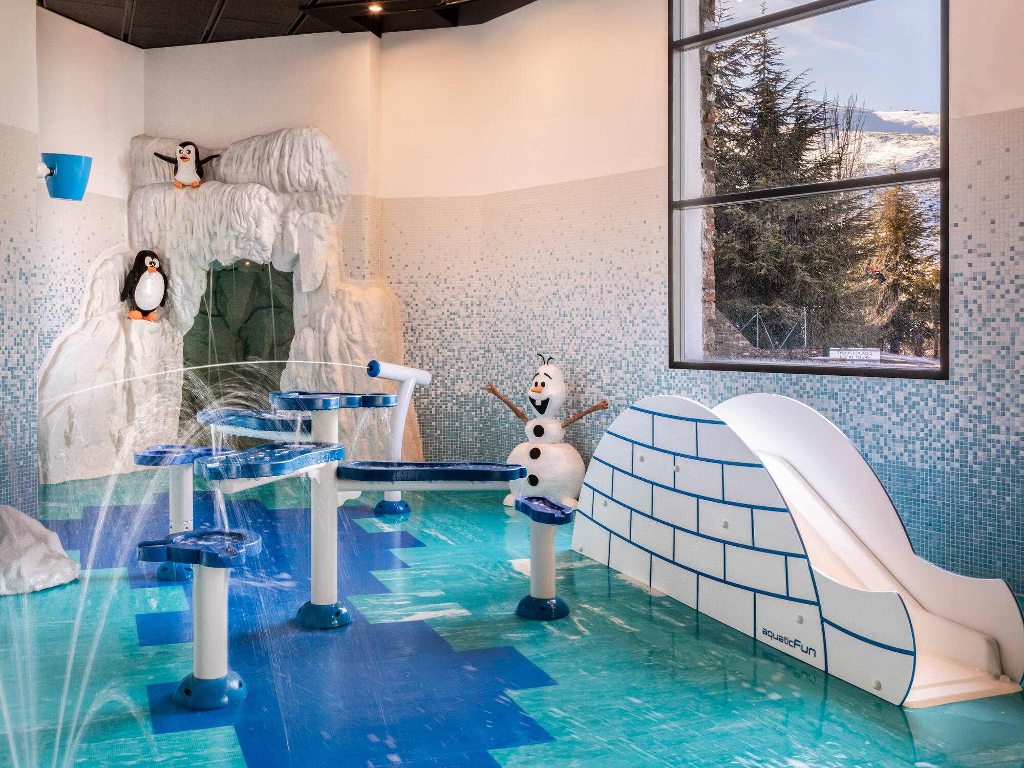 a swimming pool with a waterfall