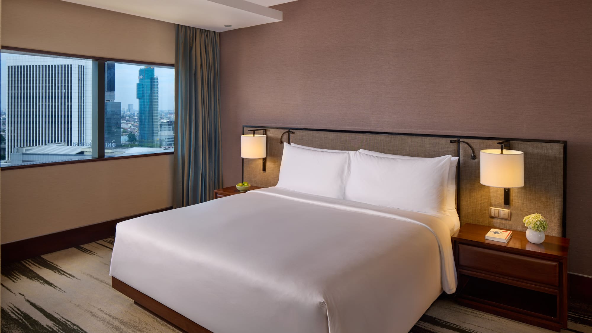 a bed in a hotel room