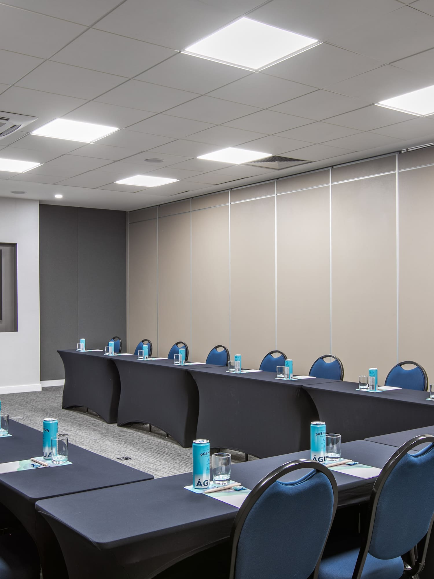 a room with tables and chairs