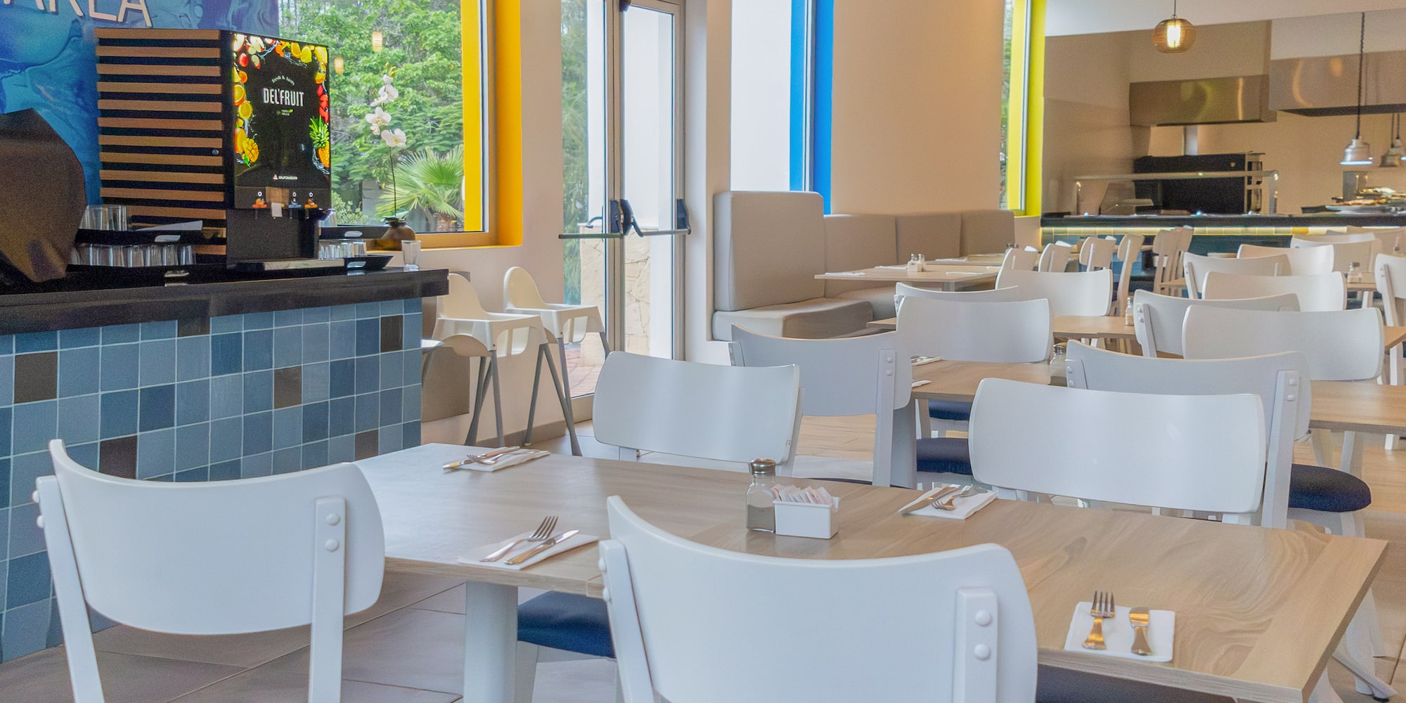 a room with tables and chairs