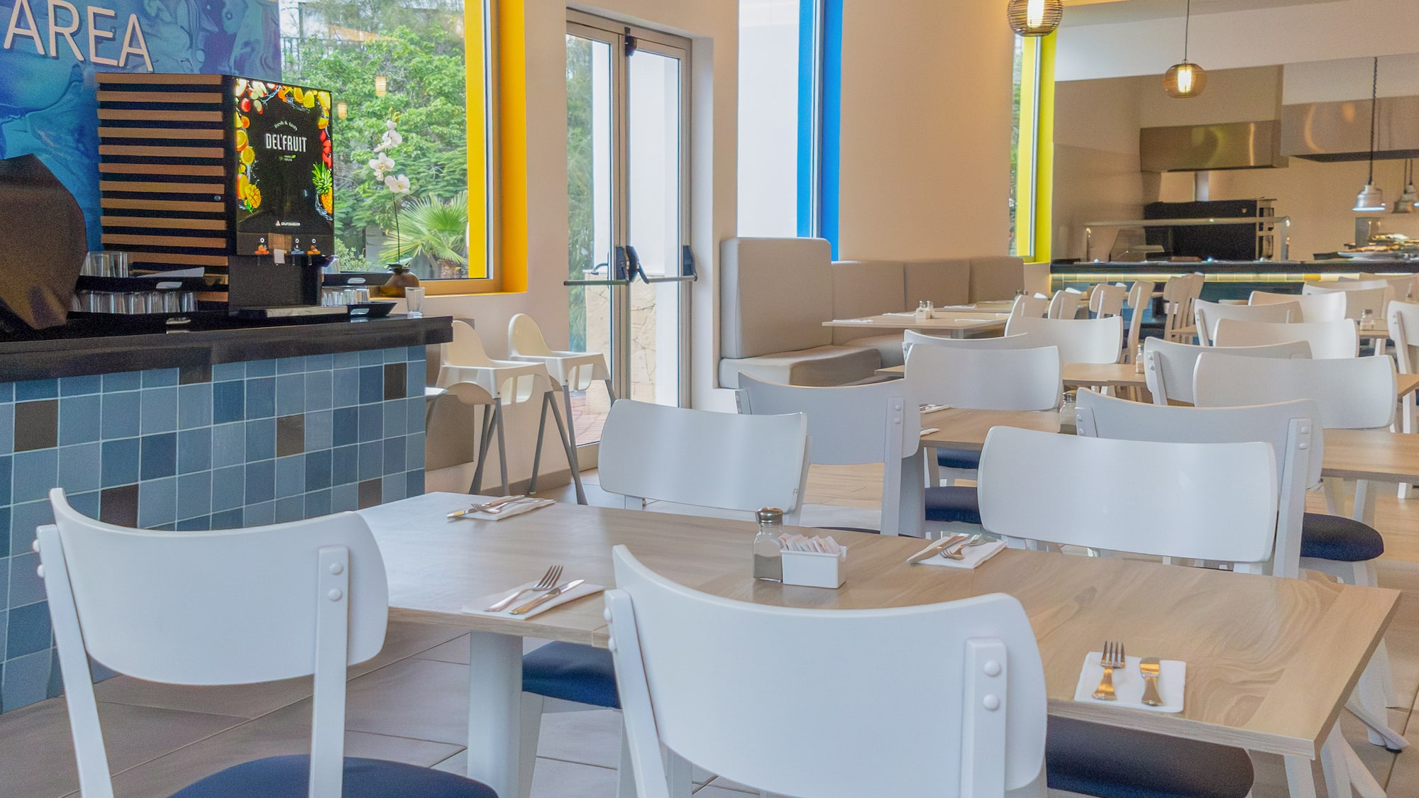 a room with tables and chairs