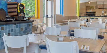 a room with tables and chairs